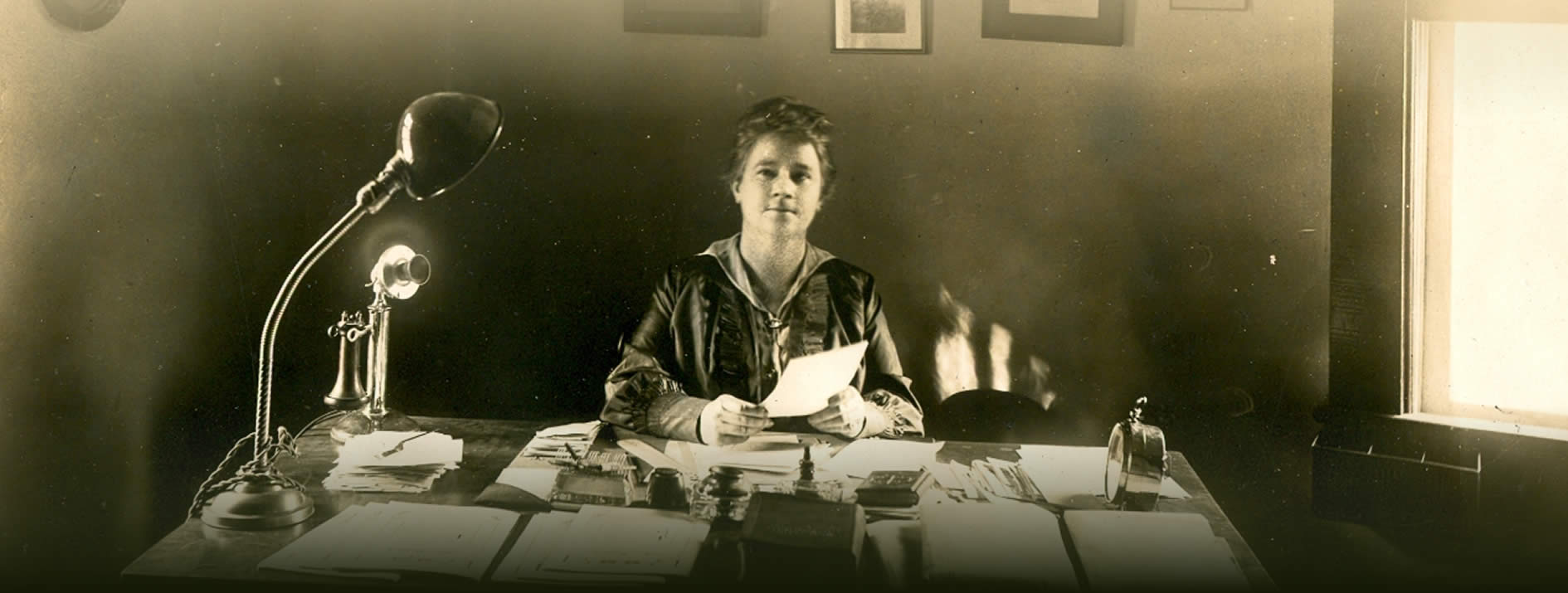 Martha Berry at her desk