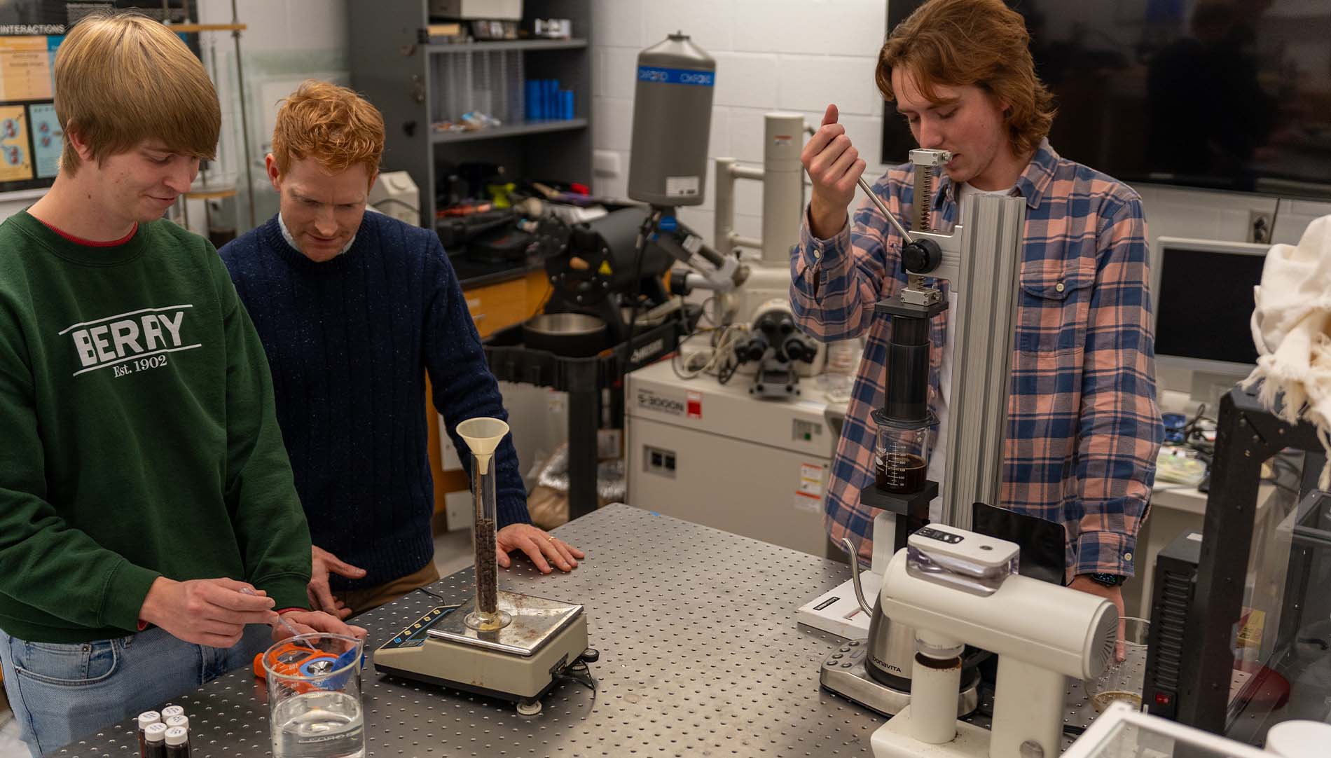 three students studying coffee