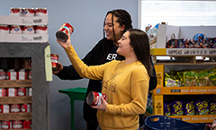 students working in a food pantry